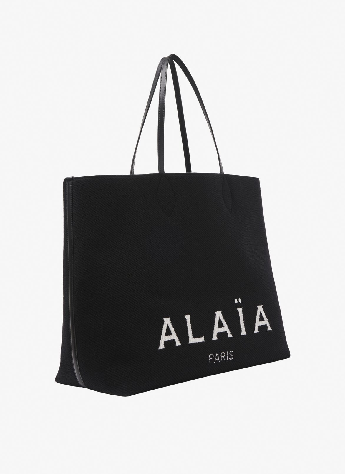 Large knit tote bag ALAÏA BLACK LARGE KNIT TOTE BAG